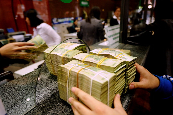 Ngân hàng Nhà nước Việt Nam tiếp tục hạ lãi suất cơ bản để cứu vớt tăng trưởng
