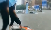 Làm mưa nhân tạo để chống hạn khiến Cát Lâm lụt, cuốn trôi xe ô tô