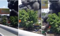 Cháy lớn tại bãi xe ở huyện Bình Chánh, nhiều phương tiện vận tải bị thiêu rụi