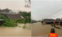 Ảnh: 'Đại hồng thủy' ở Quảng Bình khiến hàng vạn ngôi nhà bị ngập