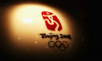 RFA: Người Duy Ngô Nhĩ rước đuốc Olympic Bắc Kinh 2008 bị phạt 14 năm tù vì xem video