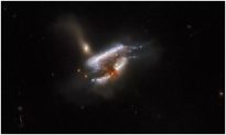 Hubble chụp được hình ảnh tuyệt đẹp về 3 thiên hà hợp nhất với nhau