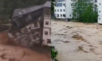 Trung Quốc: Miền Bắc nắng nóng gay gắt, miền Nam mưa lũ sập nhà gây thương vong