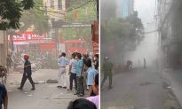 Hà Nội: Sự cố báo cháy trên phố Hoàng Văn Thái bị lỗi, người dân đi trong khói mù mịt