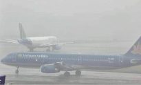 Ngày 7/12, nhiều chuyến bay không thể đáp xuống sân bay Nội Bài vì sương mù
