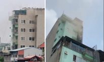 Hà Nội: Cháy chung cư mini 9 tầng, nhiều người leo lên mái chờ giải cứu